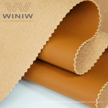 Proveedor de material de tapicería de relleno de asiento de coche de microfibra de asiento automático en relieve PU de Eco